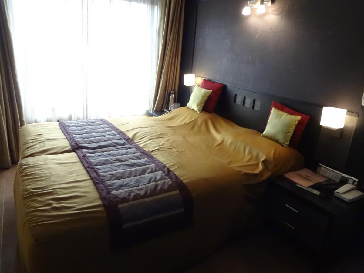 Hotel Sampoorna Mumbai Quarto foto